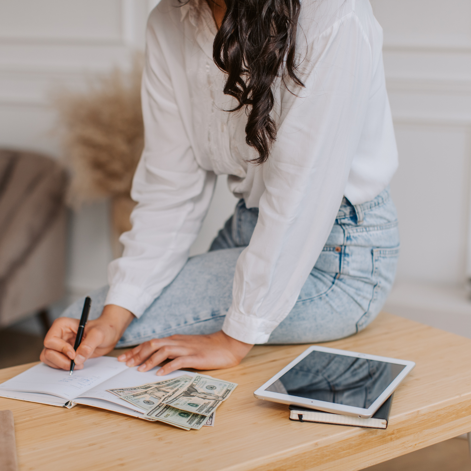 women working on her budget