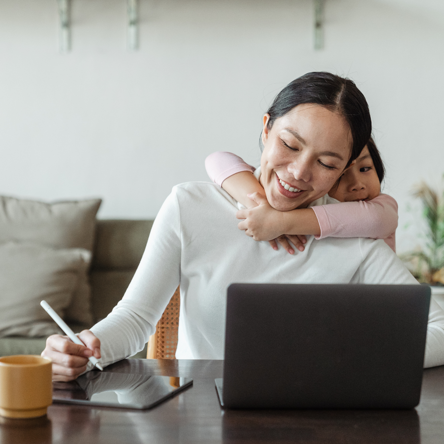 a mom and her daughter going over finances