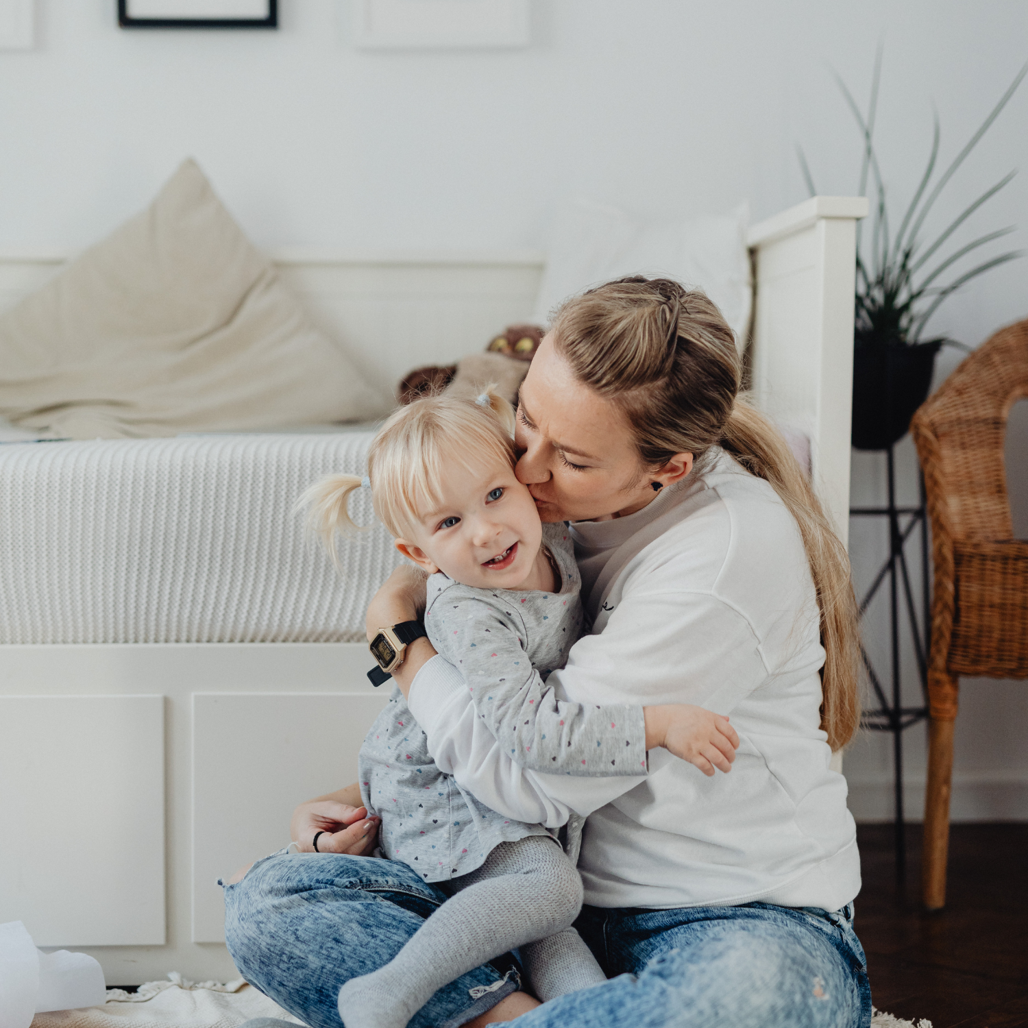 mom and daughter embracing