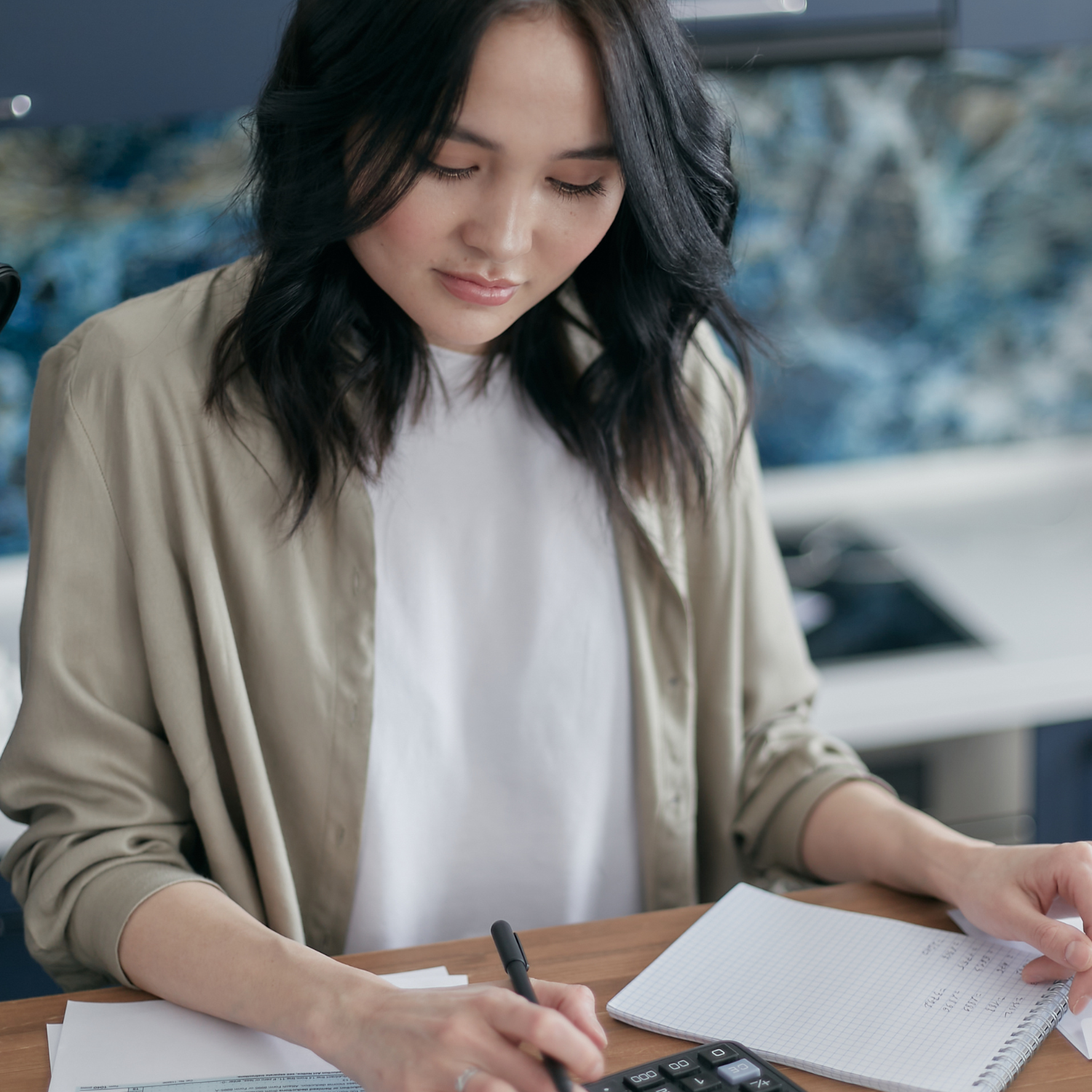 Single woman budgeting with confidence