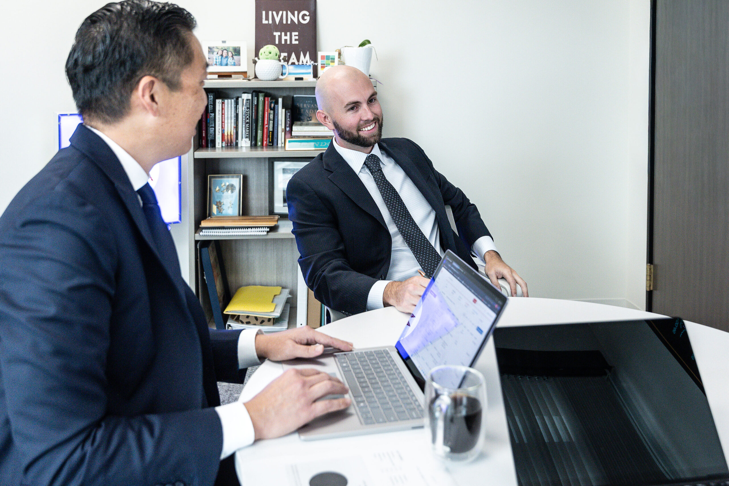 men laughing at a meeting