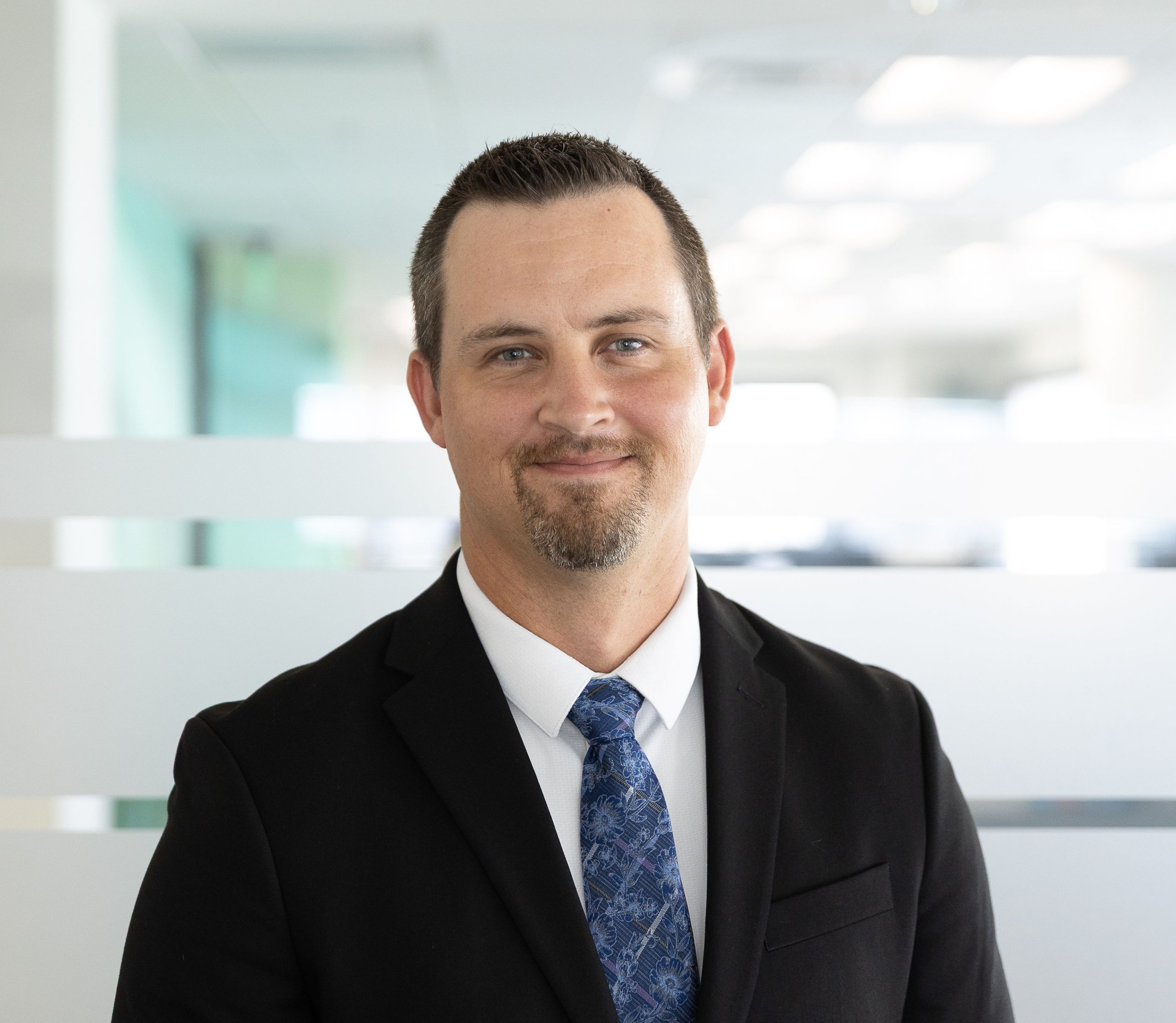 Chief Wealth Manager of Apriem Advisors, Chris Whitaker, meeting with his clients